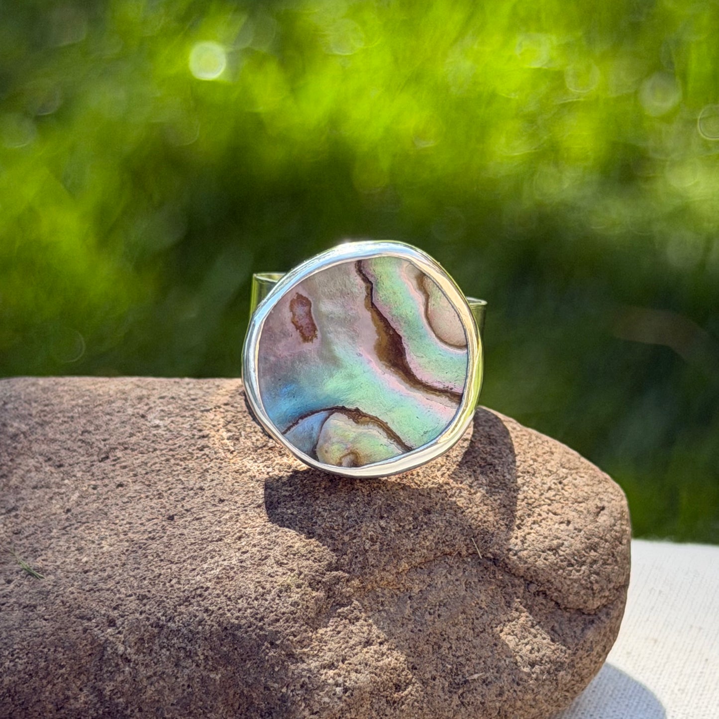 Adjustable abalone ring
