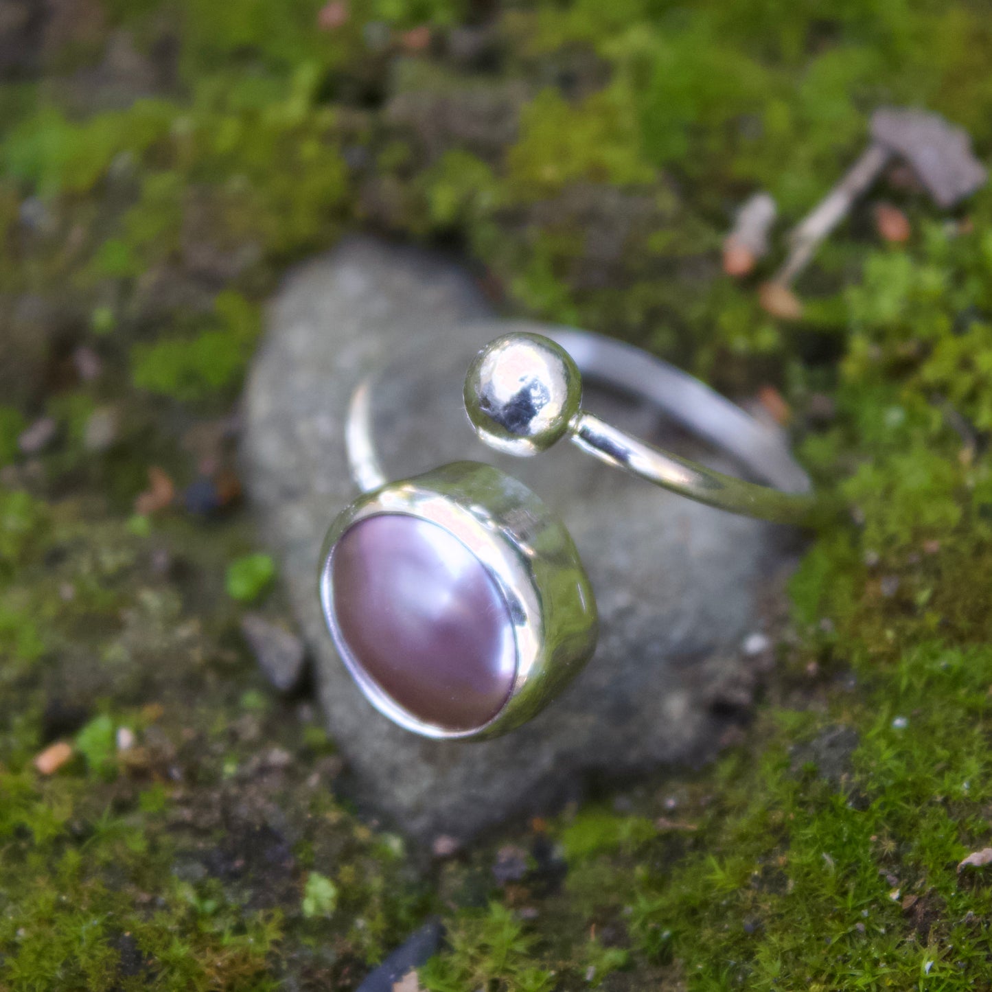 Pink pearl swirl ring