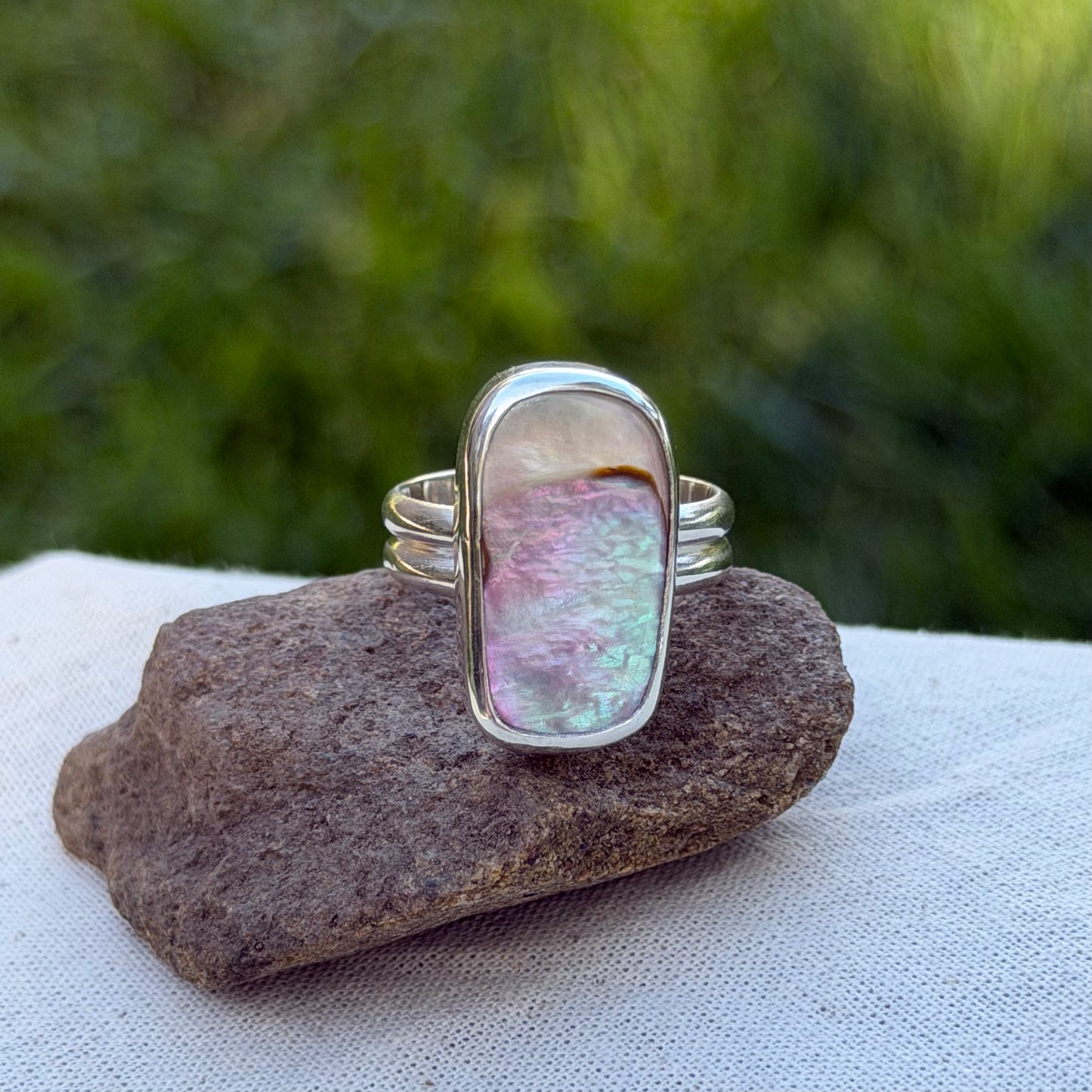 Adjustable abalone ring