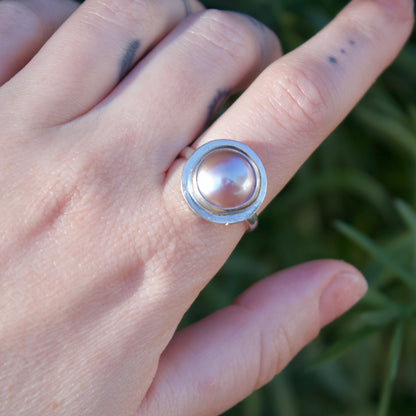 Adjustable pink pearl ring