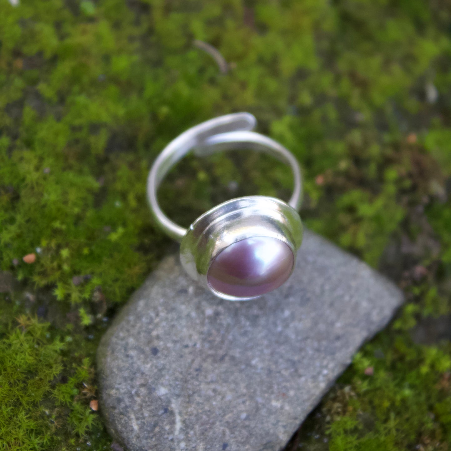 Adjustable pink pearl ring