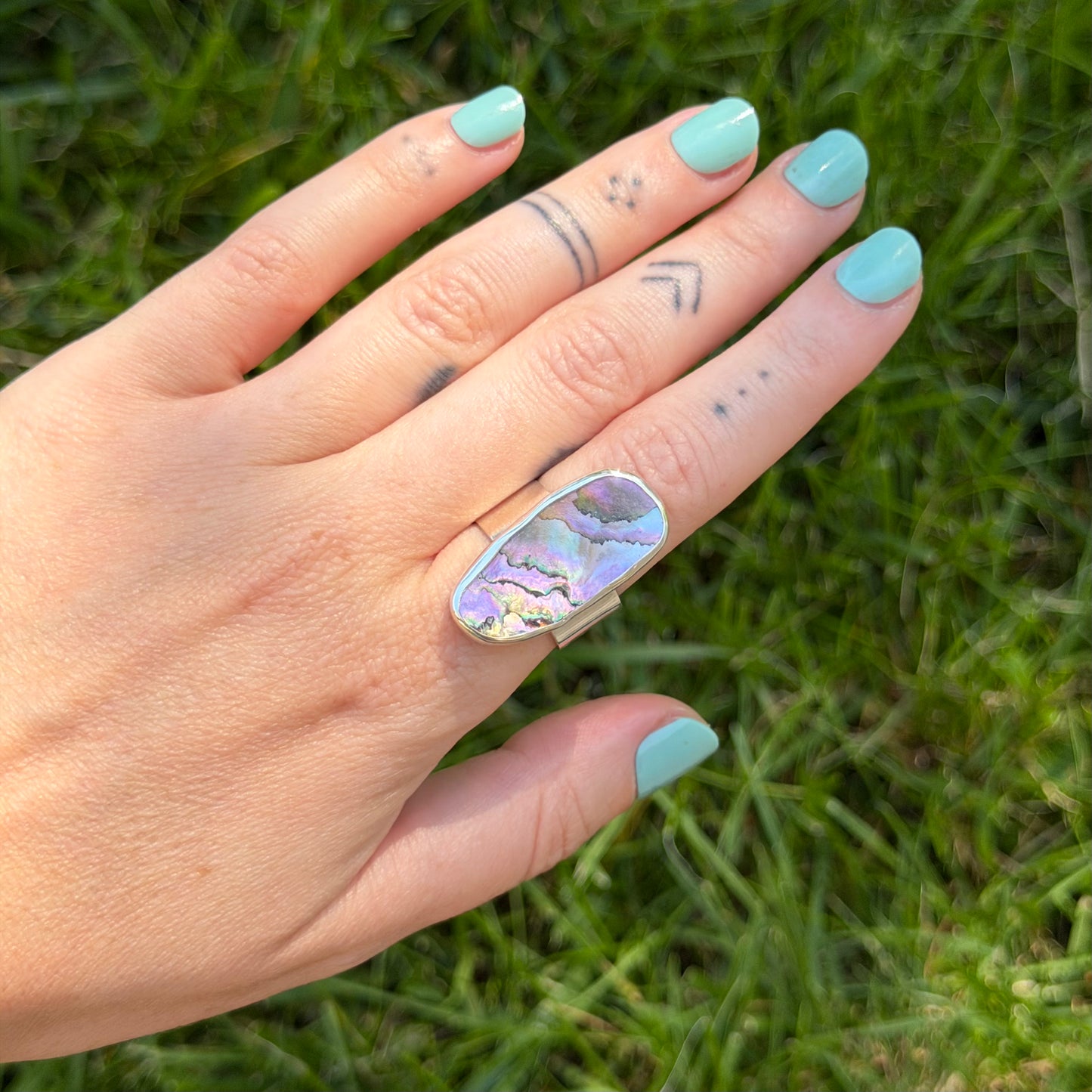 Adjustable abalone ring