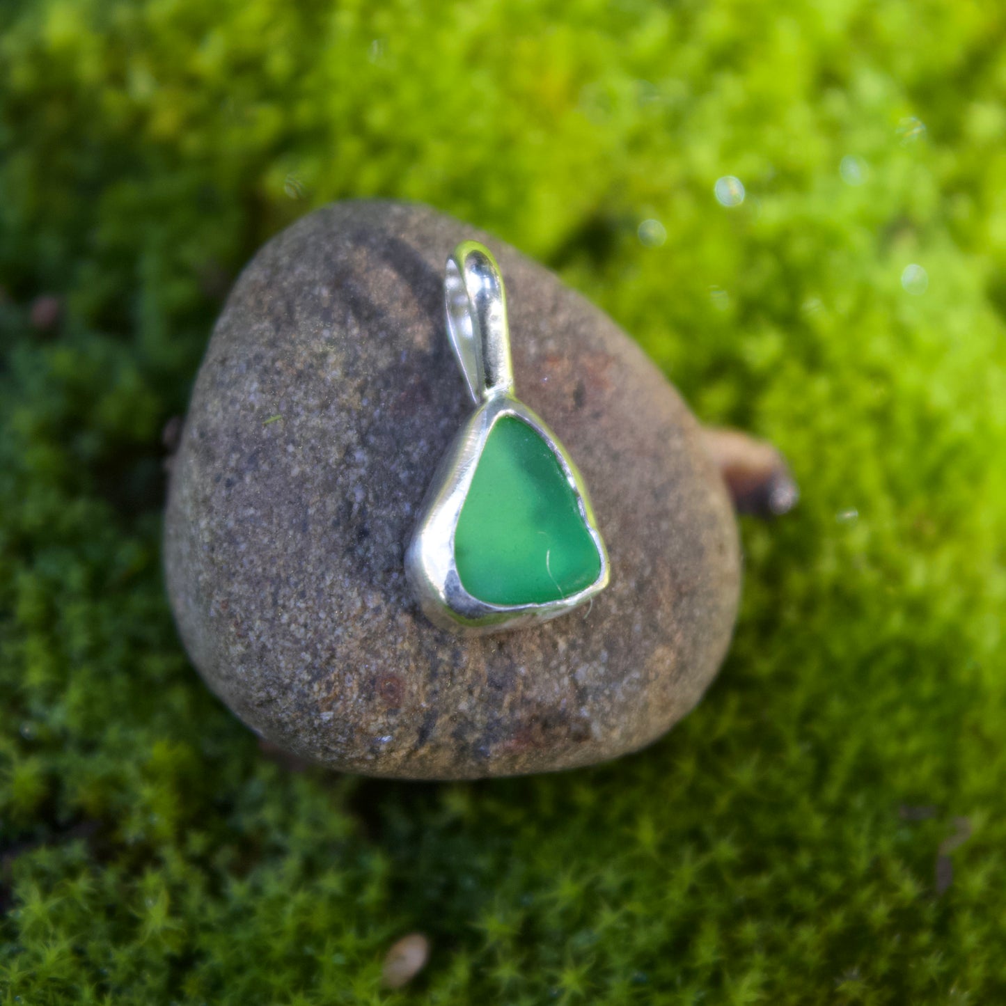 Green sea glass charm