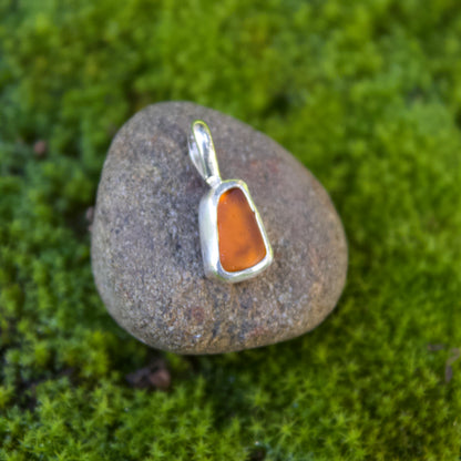 Orange sea glass charm