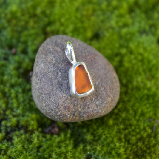 Orange sea glass charm
