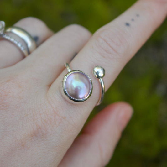 Pink pearl swirl ring