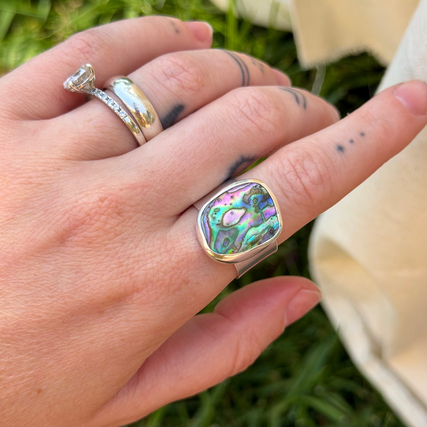 Adjustable abalone ring